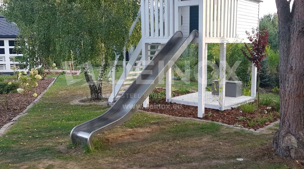 Playground slide mount to tower